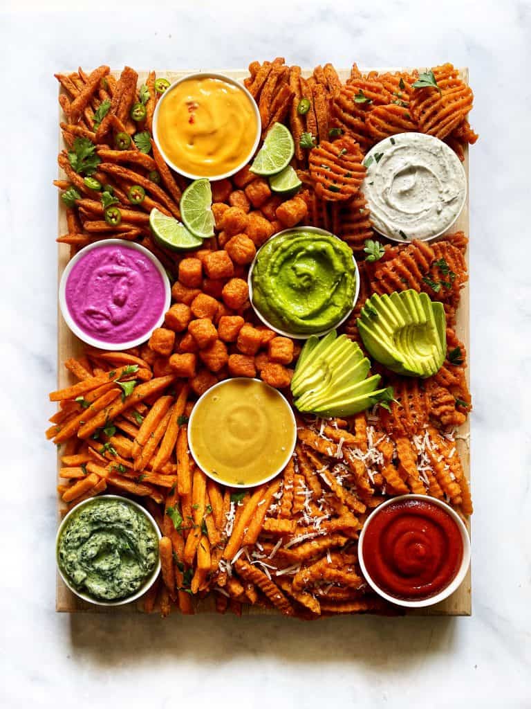 A Sweet Potato Fry Board with Rainbow Sauces