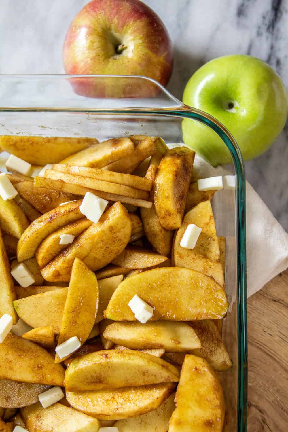 A baking pan of apples ready for the oven.