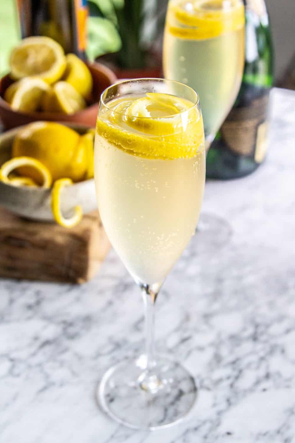 California 75 cocktail with a lemon twist.`