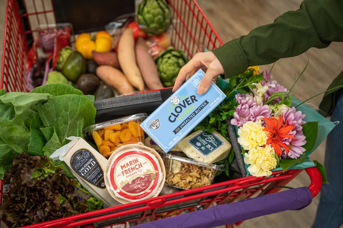 Shopping cart full of CA GROWN Goods