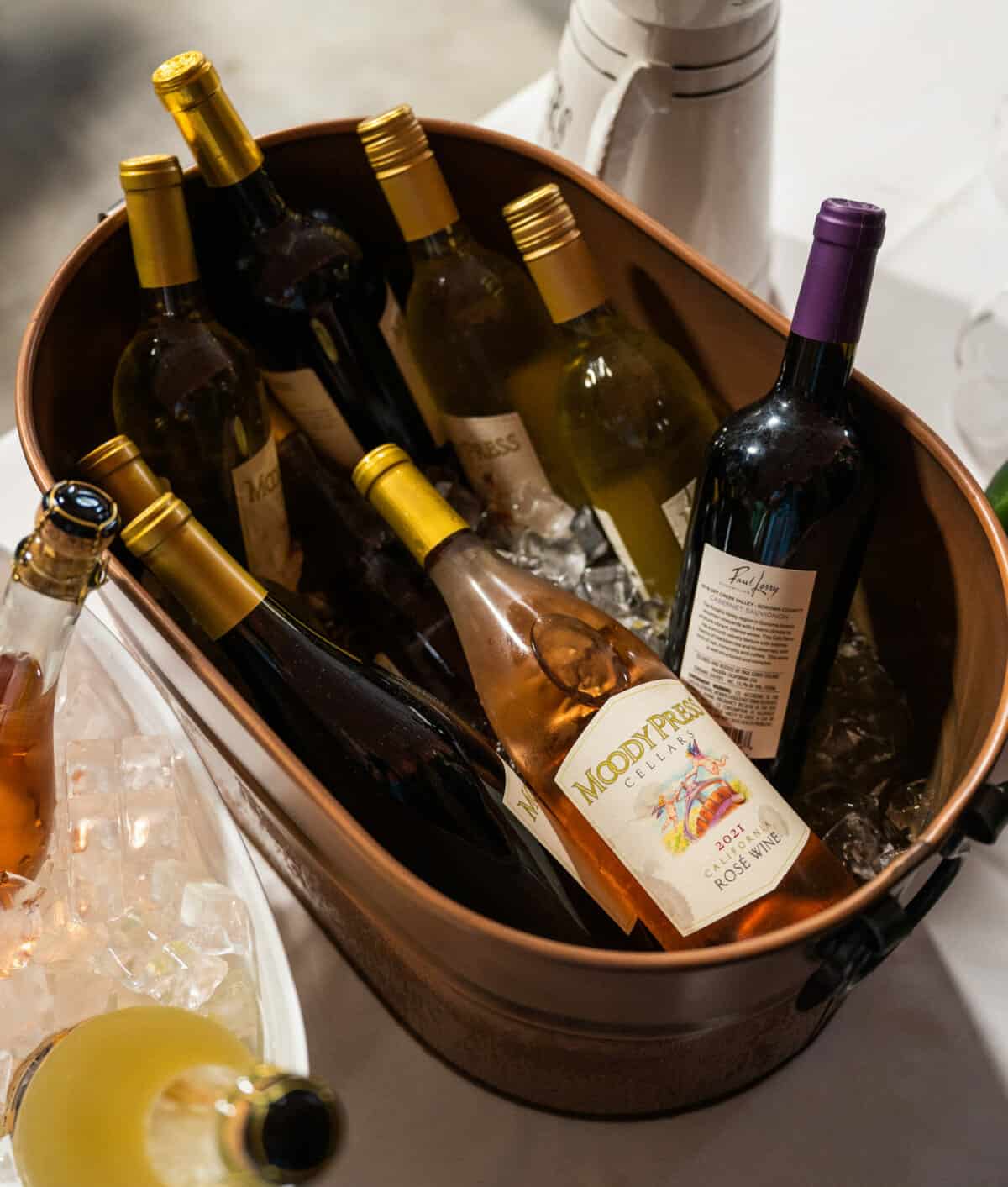 Wine bucket with Moody Press rosé. Moody Press was the first label released by San Joaquin Winery