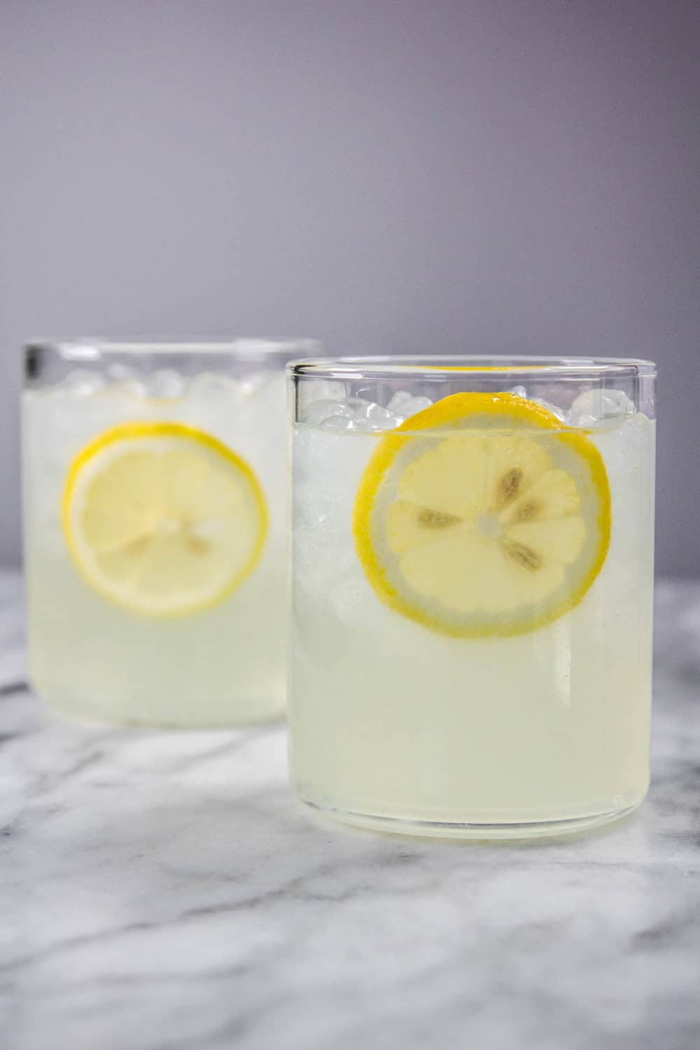 Two glasses of lemonade.