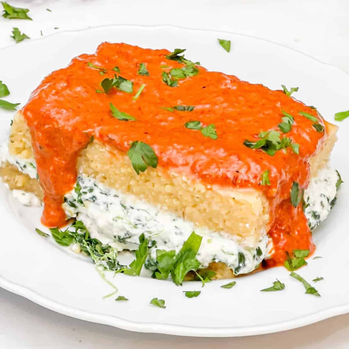 Pepper Recipes: Stuffed Polenta with Roasted Red Pepper Sauce from Jerry James Stone