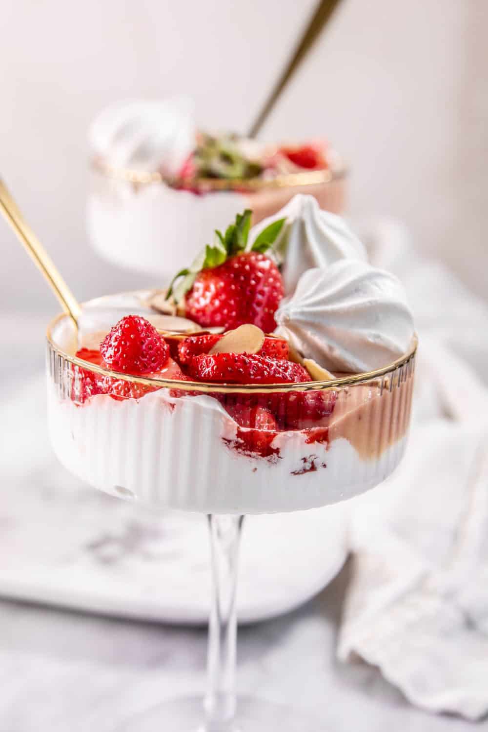 strawberry eton mess in a coupe glass - berry recipes