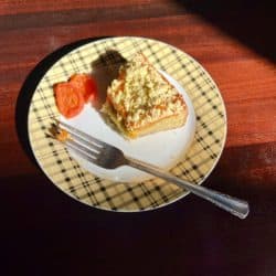 Slice of Apricot Pistachio Olive Oil Cake - Bronwen Wyatt