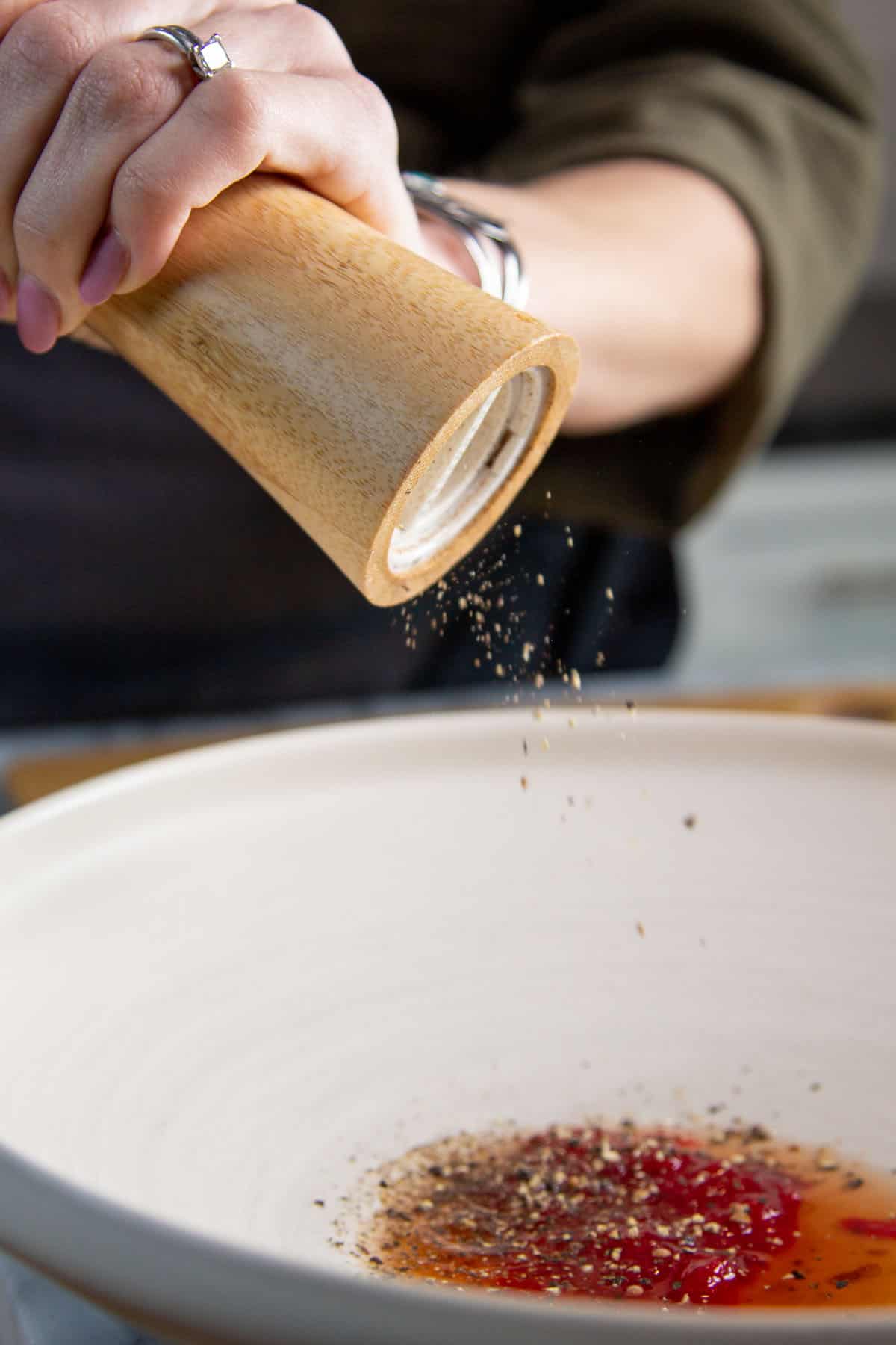 A Simple Salad With Fruit, Walnuts, And Black Pepper Vinaigrette