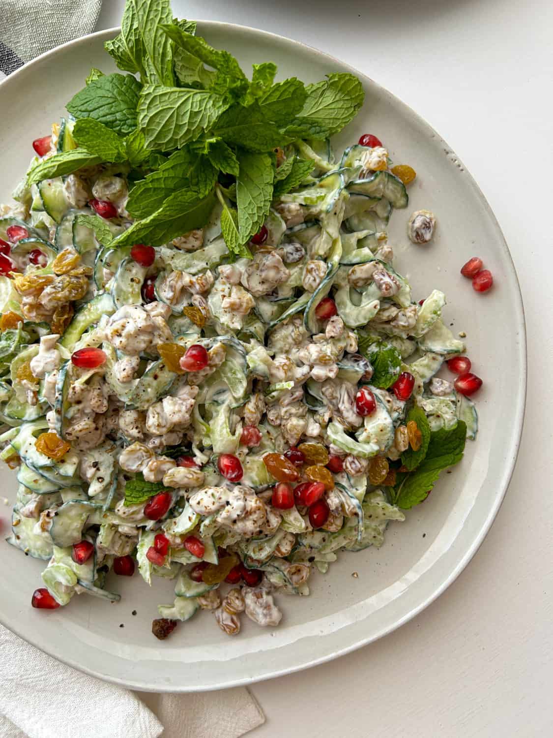 Cucumber, Yogurt, and Golden California Raisins Salad with Pomegranate by Jaíne Mackievicz