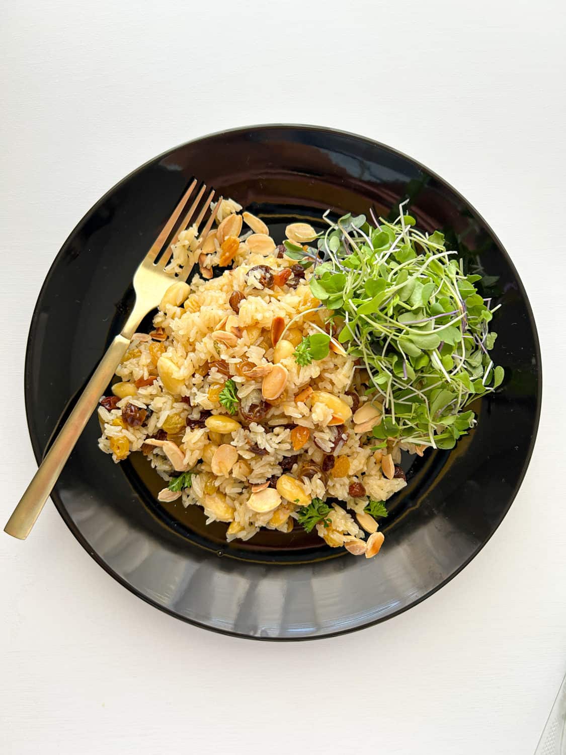 rice pilaf in a black bowl