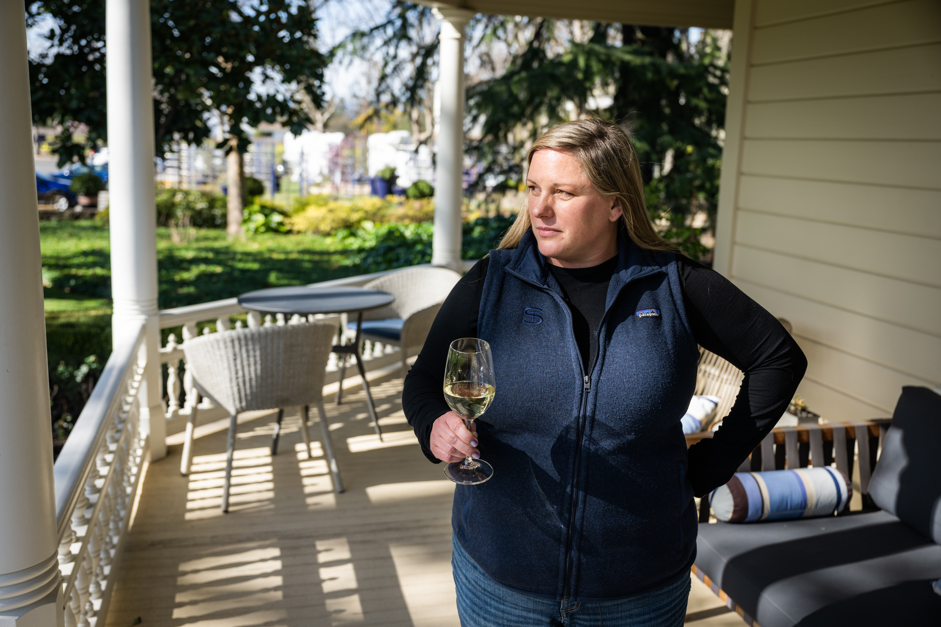 Winemaker Brooke Shenk on the porch of the historic Atkinson house at St. Supery