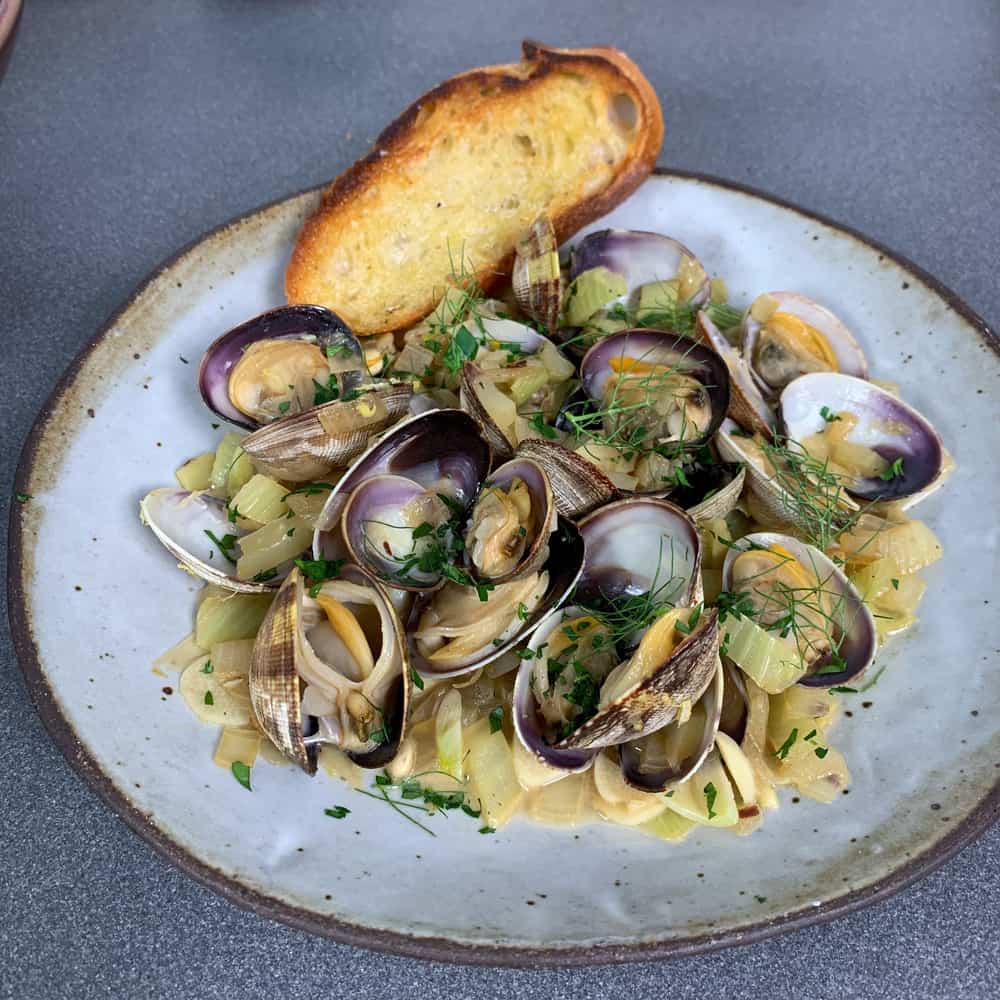 finished bowl of spicy garlic clams recipe
