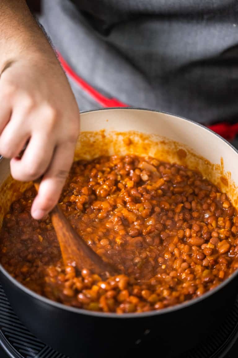 Stirring Santa Maria-style beans