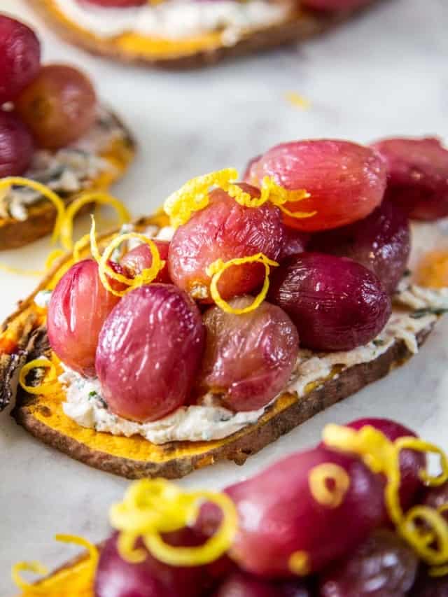 Close up of roasted grape crostini.