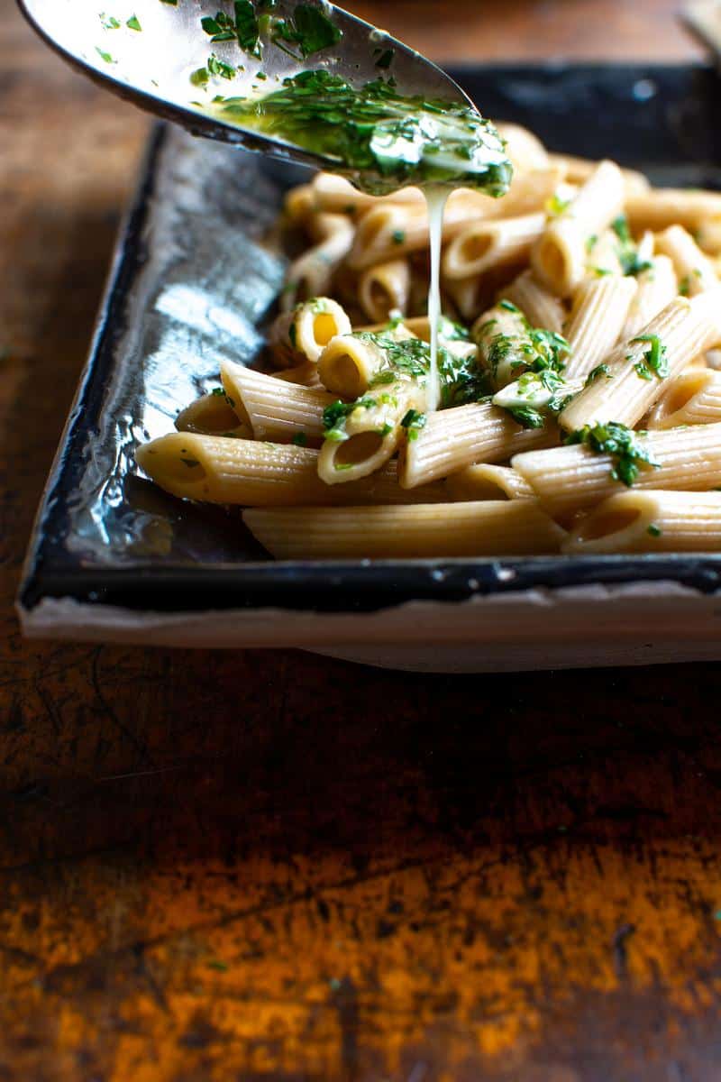 Drizzle garlic sauce on pasta