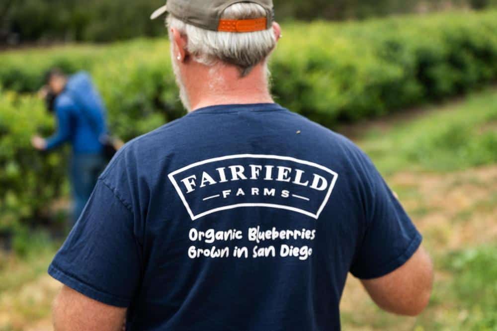 Spencer Stead wearing a Fairfield Farms Tee