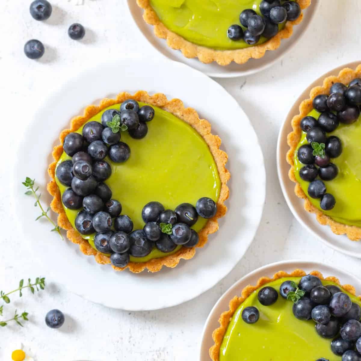 Avocado Blueberry Tarts with Almond Crust from Baking the Goods
