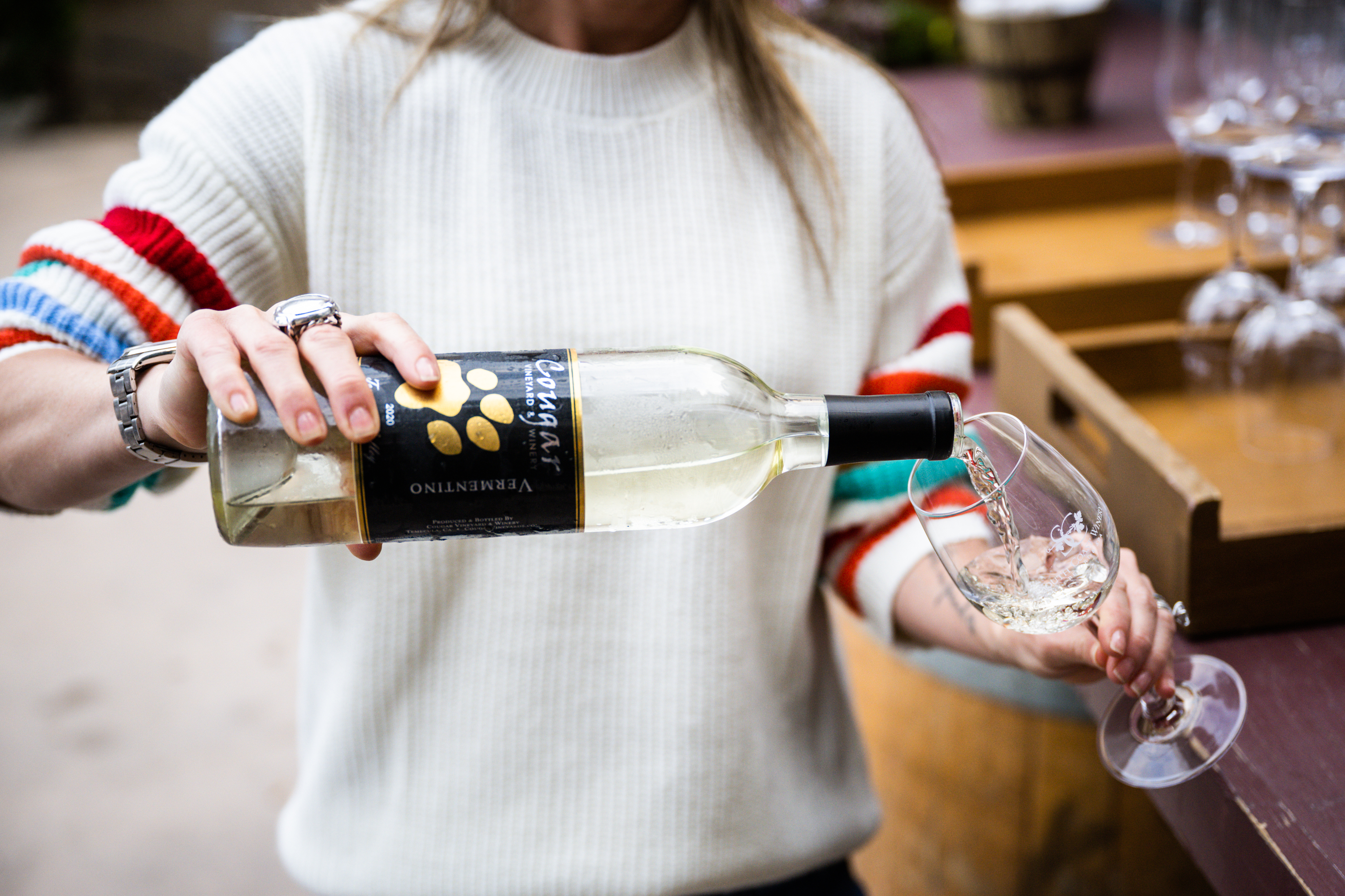 Devin Parr pouring a glass of Temecula wine