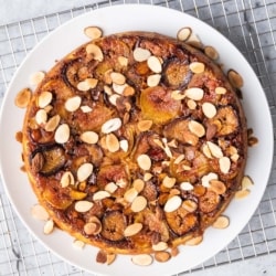 Almond-Fig Upside Down Lemon-Olive Oil Cake on a cooling rack,