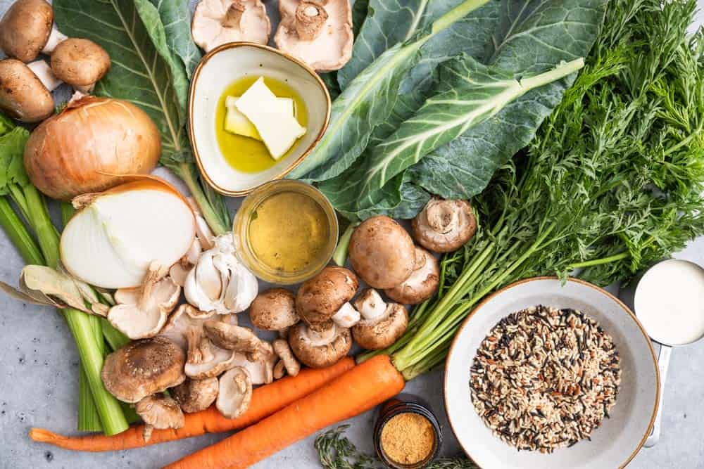 Ingredients needed to make Collard Green and Wild Rice Soup with Mushrooms.