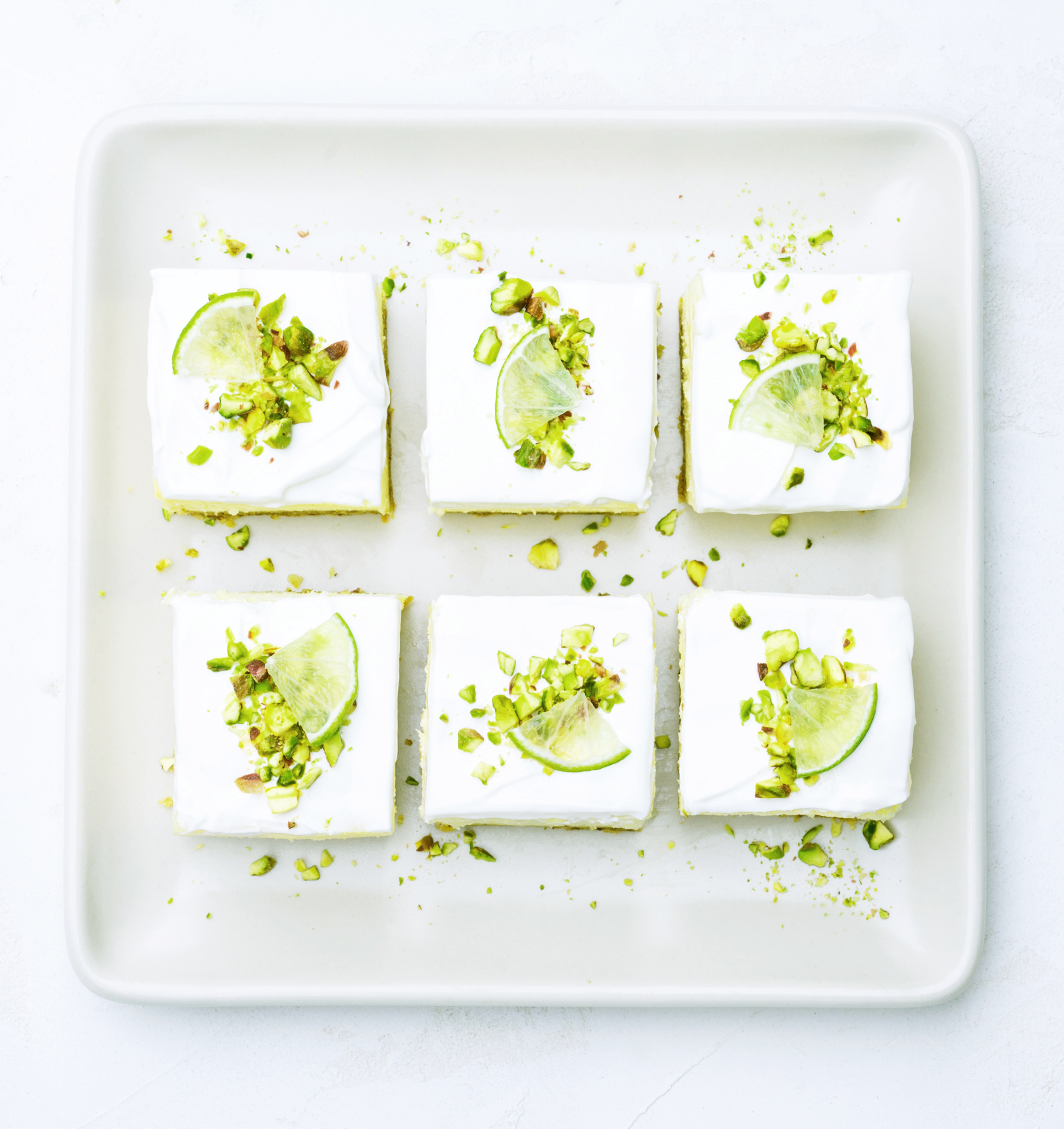 top down image of lime cheesecake with pistachio crust