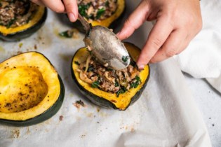 filling acorn squash for cooking