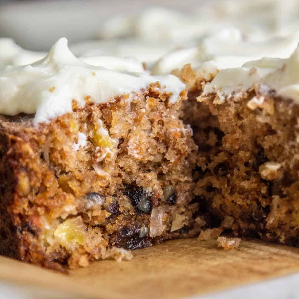 Carrot Raisin Snack Cake with a slice missing