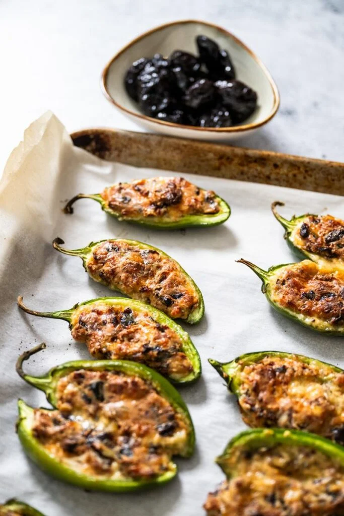 jalapeno poppers on a sheet pan