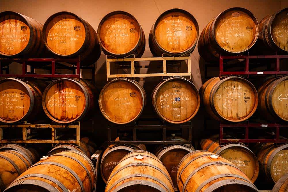 A room full of wine barrels.