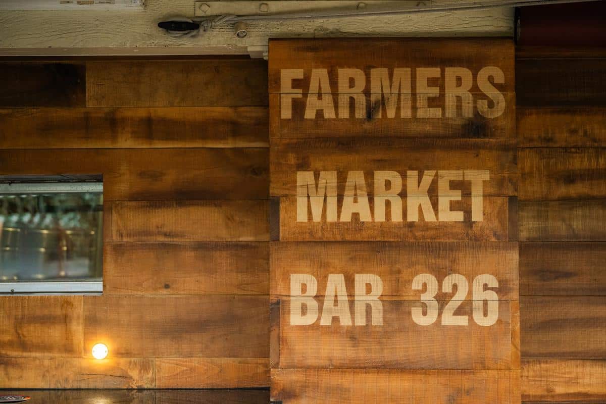 the farmers market bar sign

