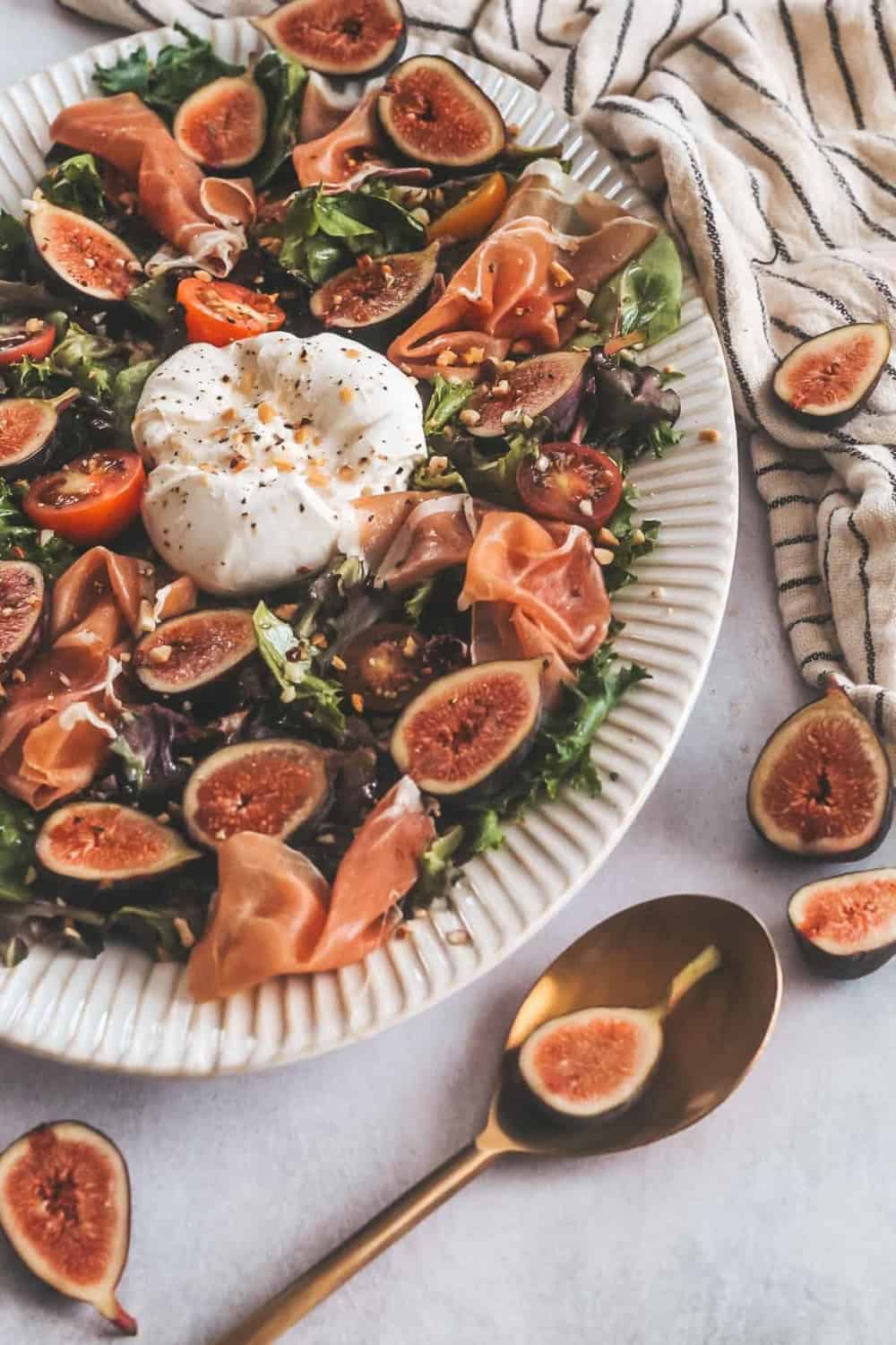 fig salad on a white platter from Britney Breaks Bread 