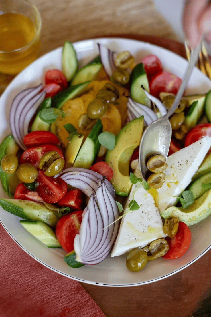 greek salad in a white bowl