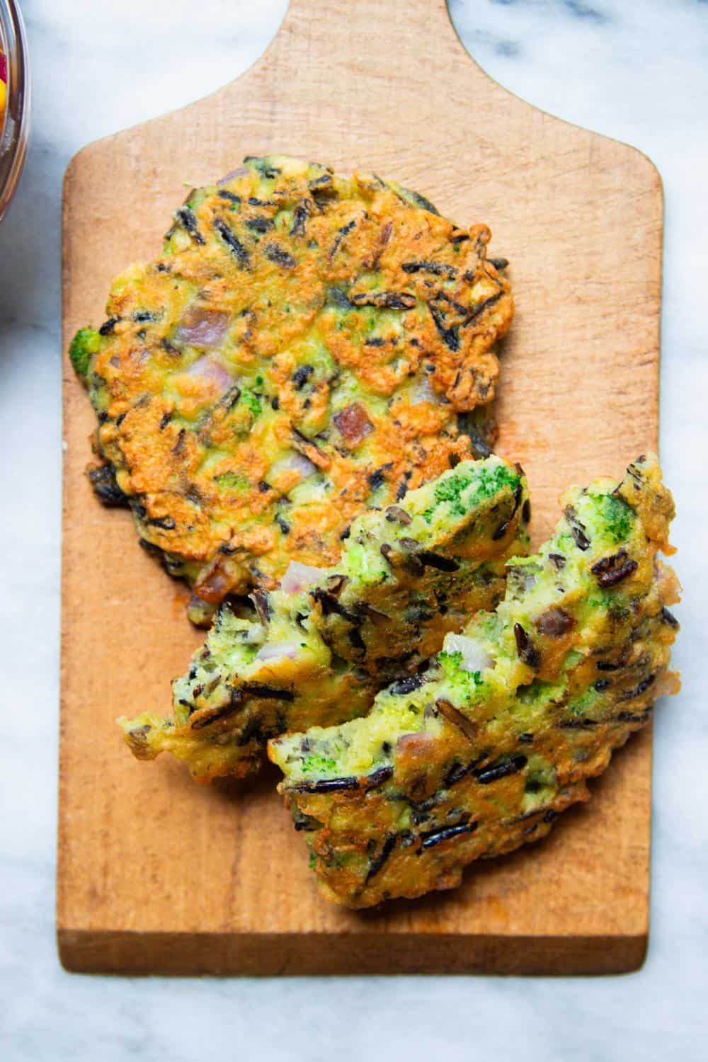 three Wild Rice Cakes on a cutting board