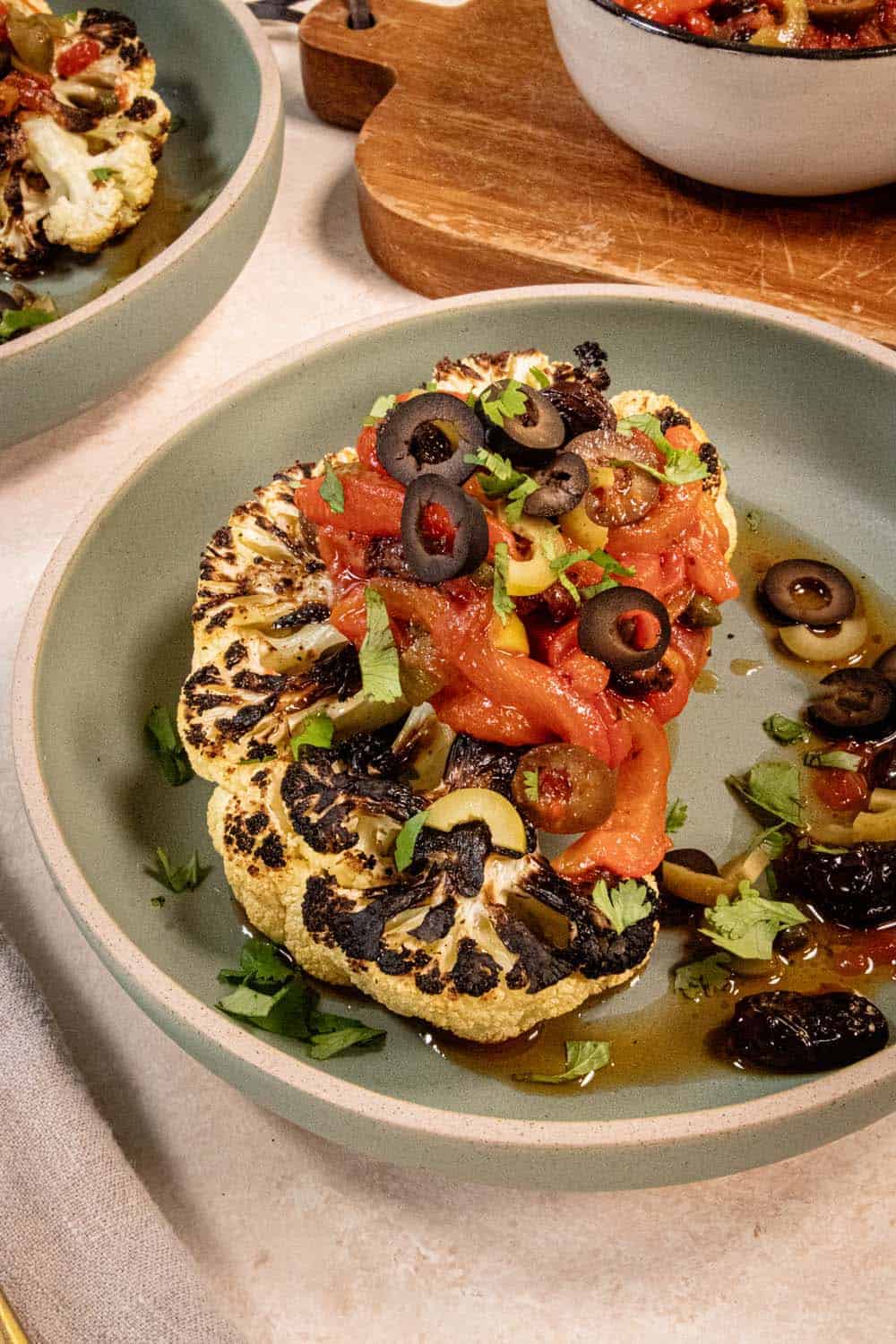 cauliflower steak with a tomato olive relish