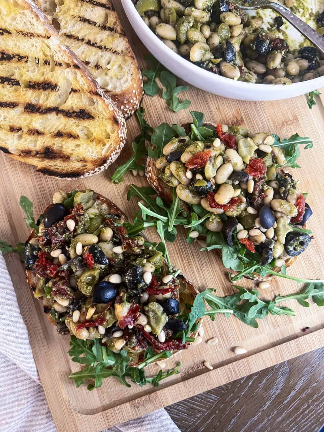 cannellini bean salad on bruschetta