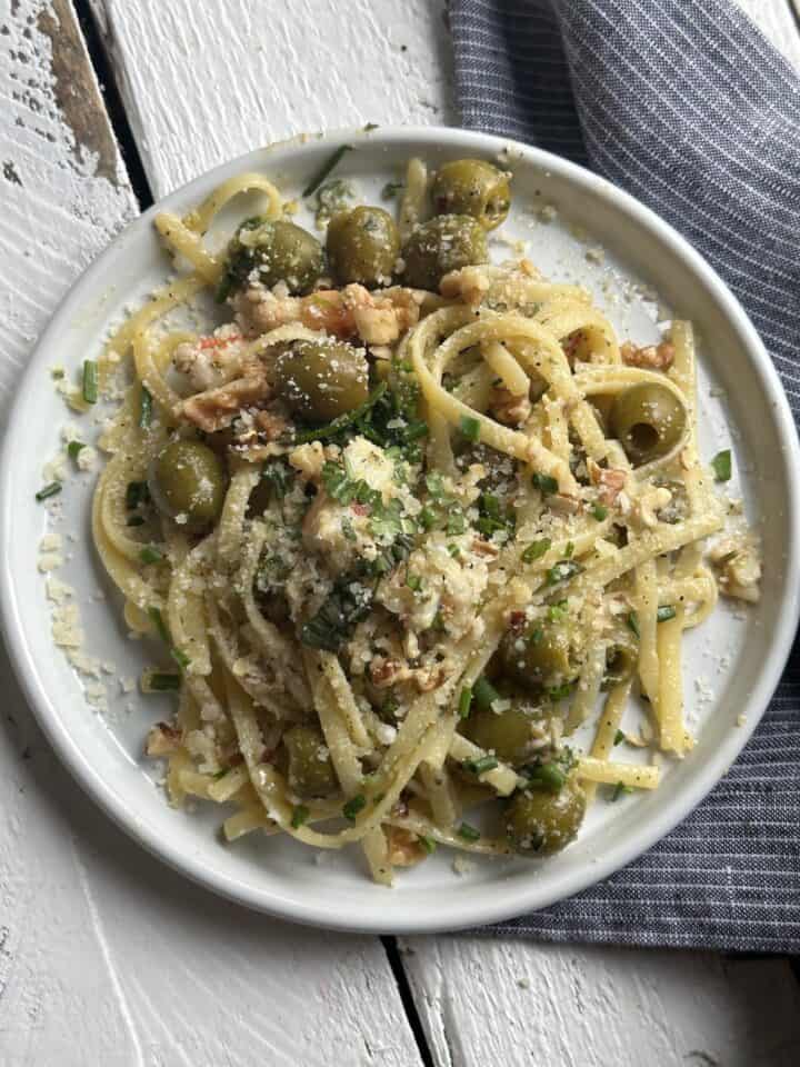 pasta with chimichurri sauce in a white bolw