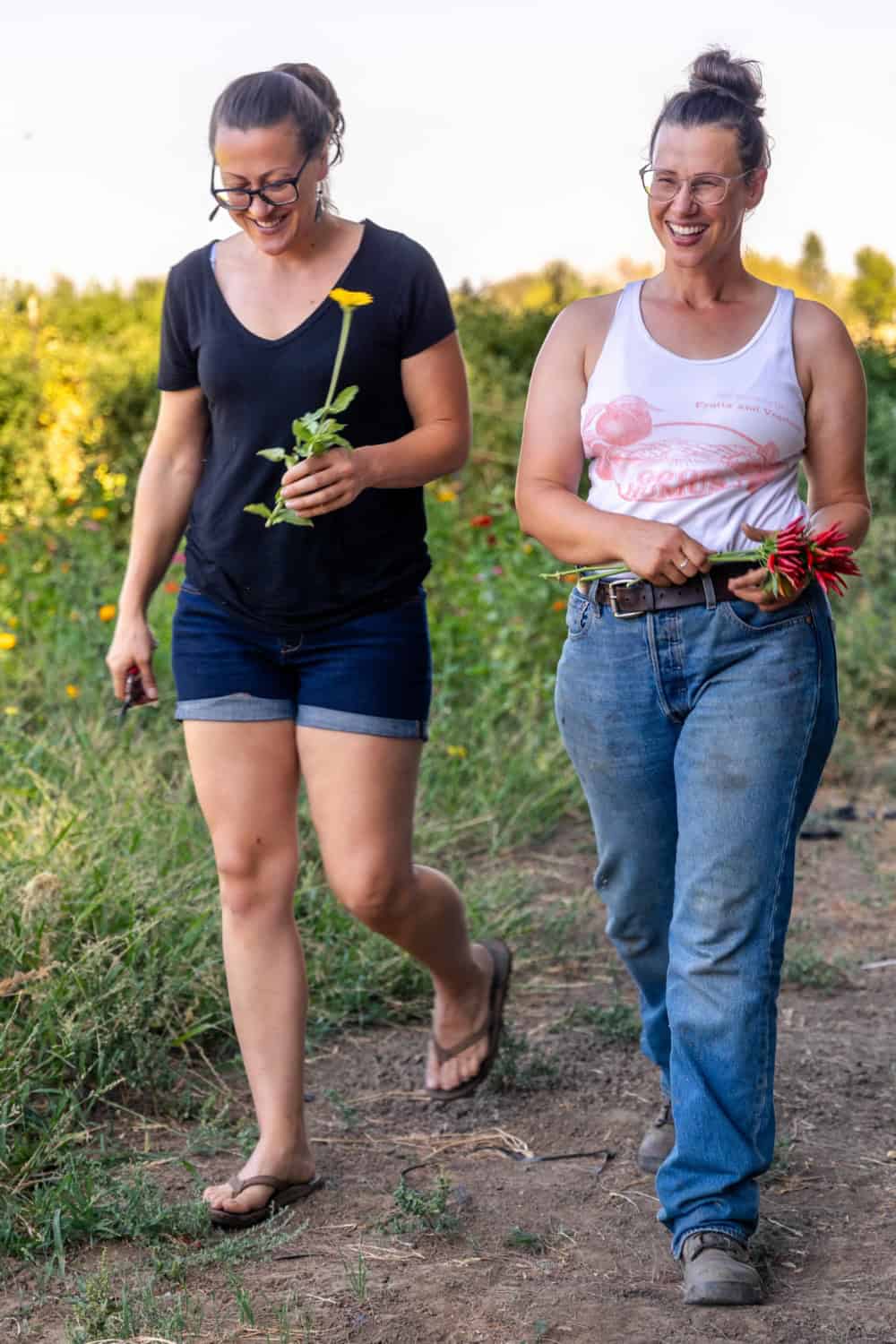 Claire and Ali Main walking down a path at Good Humus