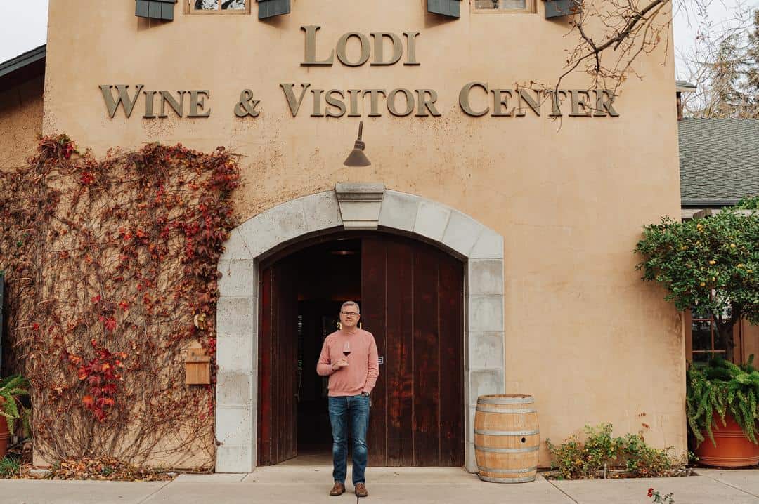 stuart, executive director of Lodi Wine and Visitor Center standing in front of the building