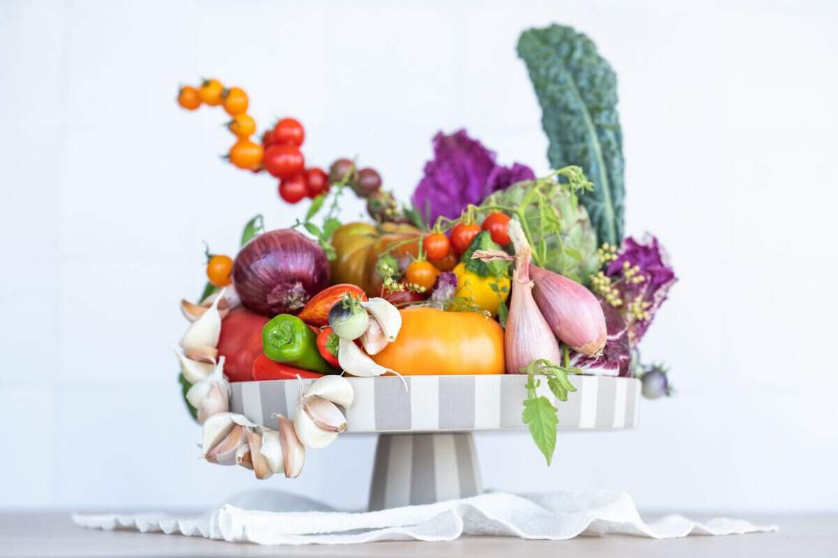 garland made of garlic draped alongside an edible centerpiece