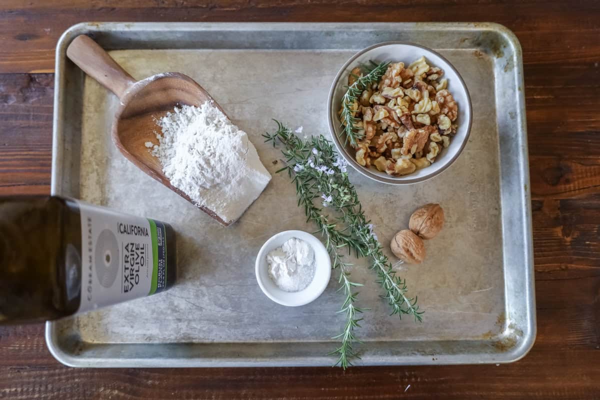 ingredients for homemade crackers on a silver baking sheet