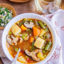 A bowl of hearty vegetable stew ready to serve.