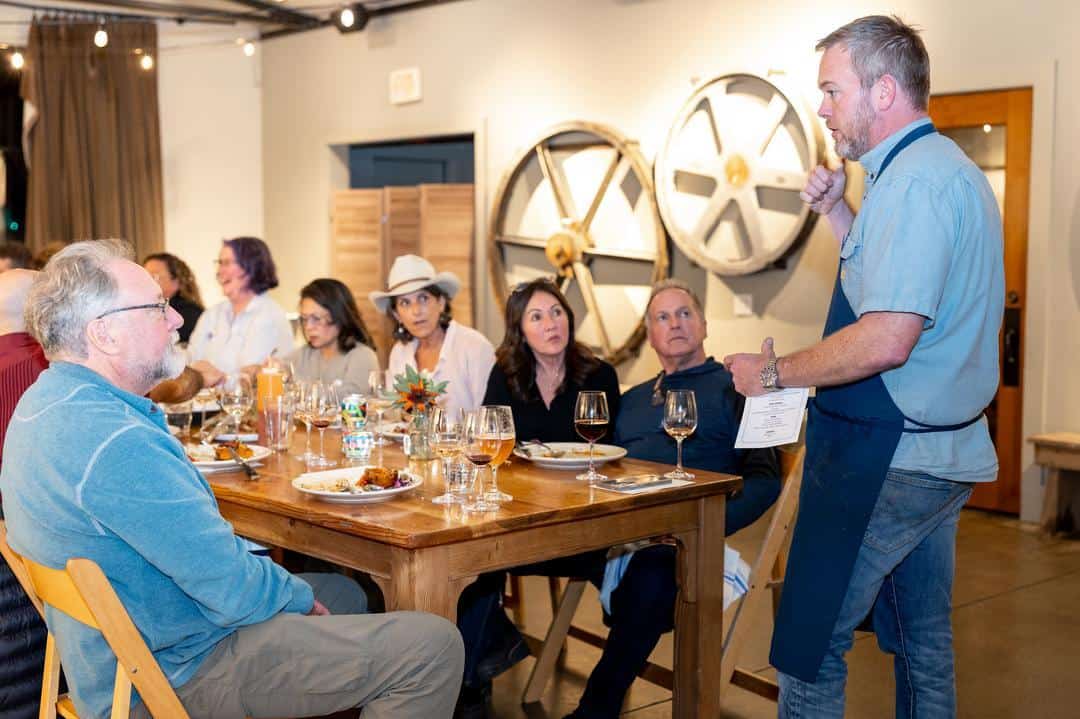 Chef Kip Ramsey at Farmstead Restaurant educating guests about how their food was grown and prepared 