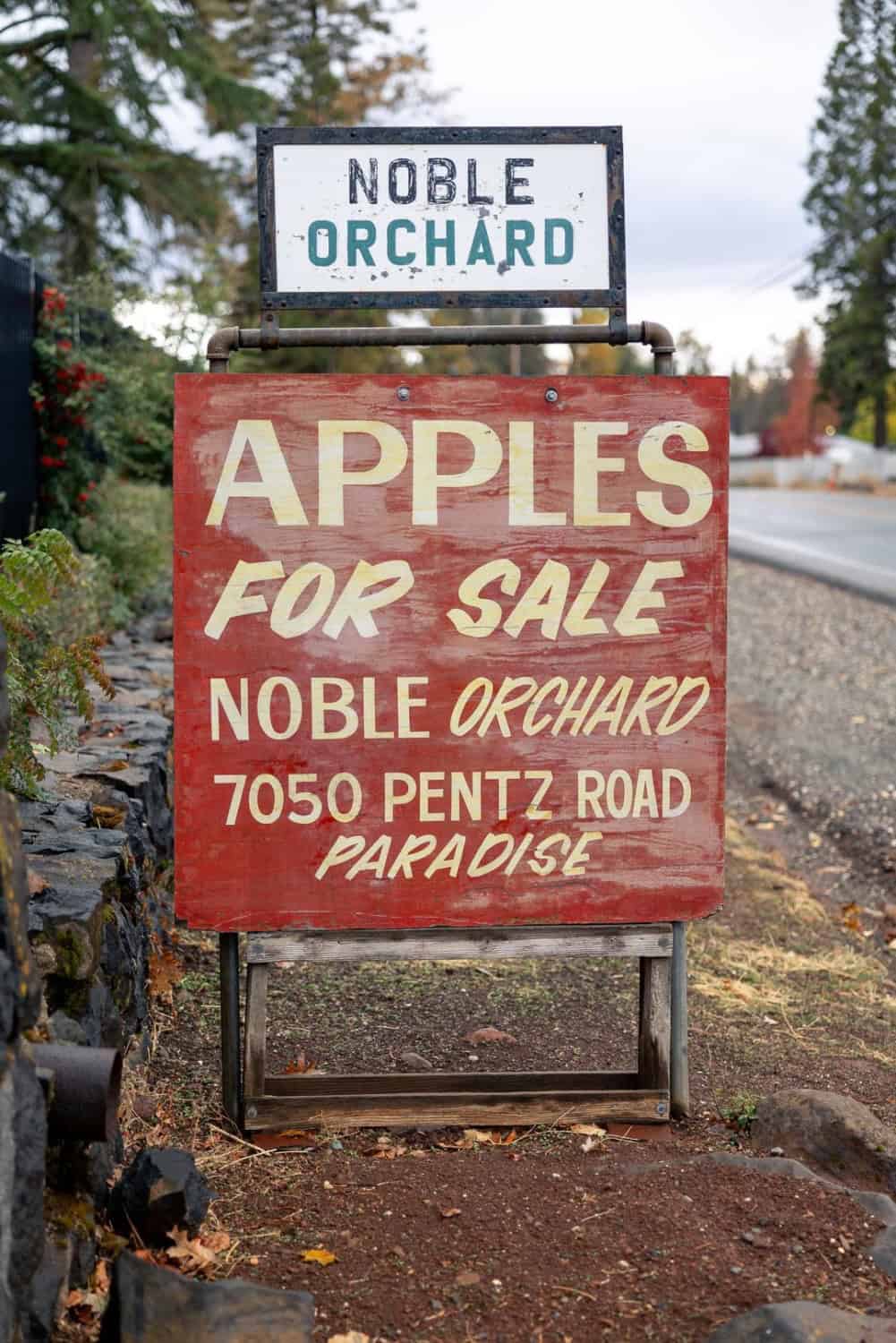 the sign in front of Noble Orchards