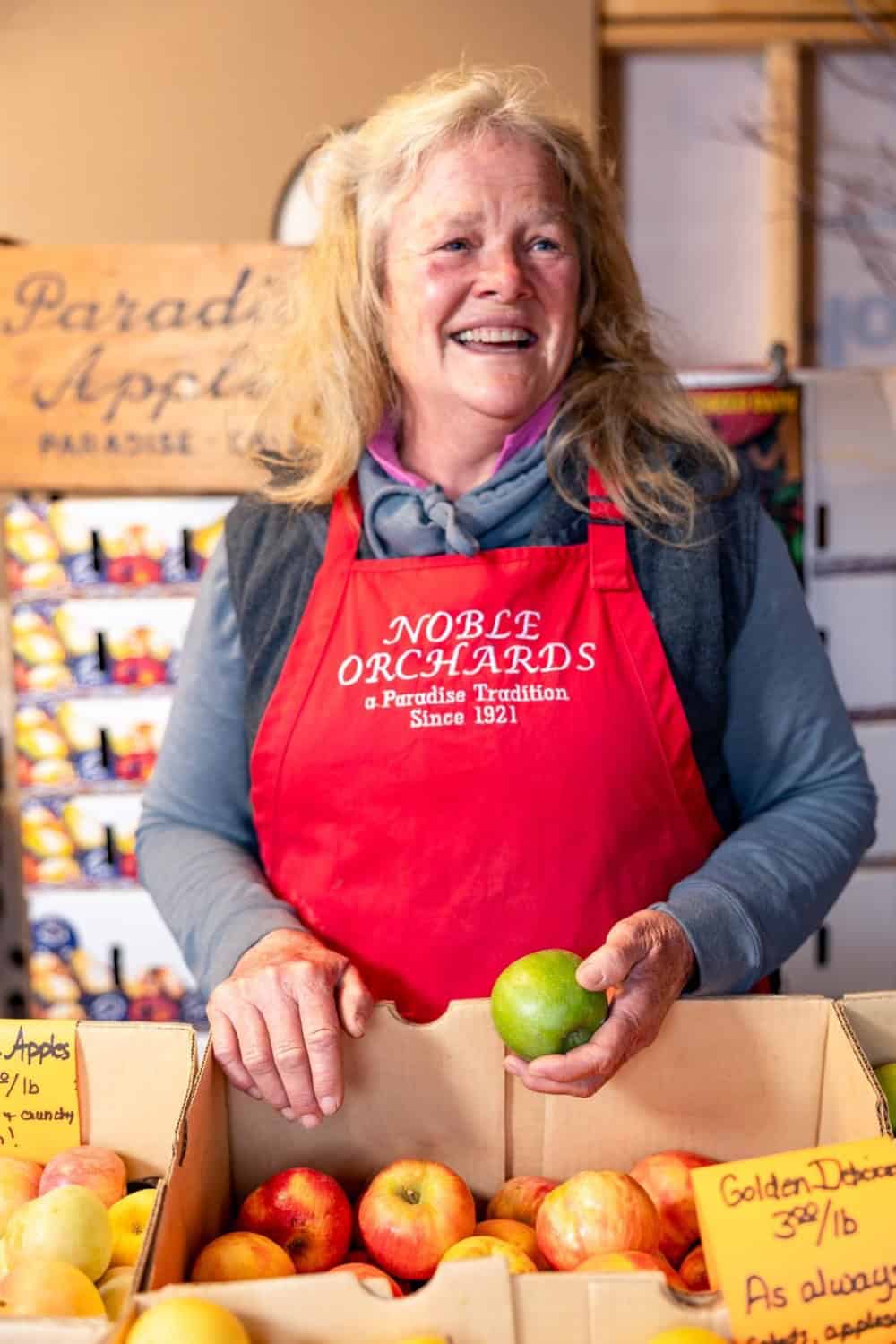 Laurie Noble of Noble Orchards with some of the apples grown at her family's orchard