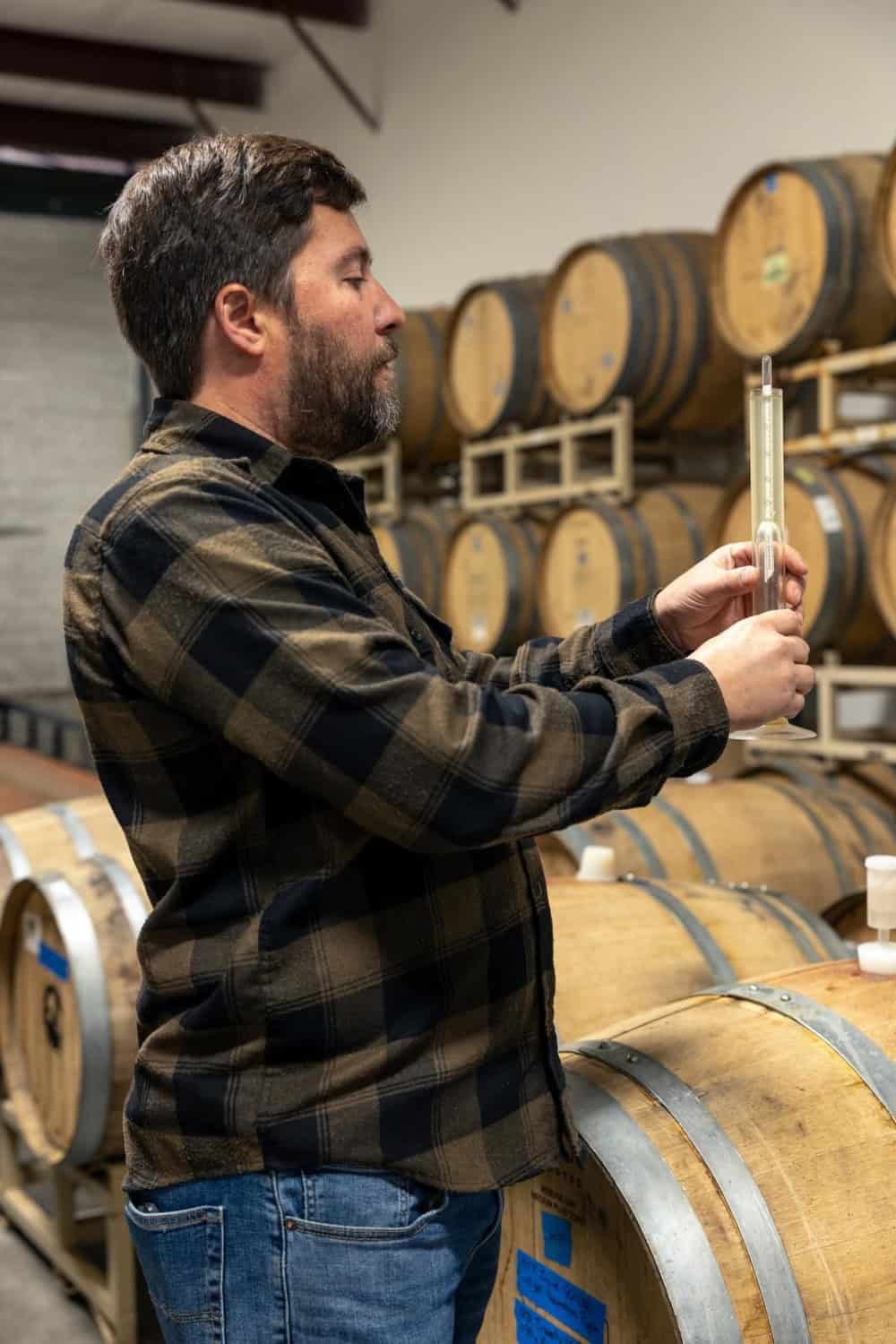 Ben nielsen making cider at Lassen Traditional Cidery