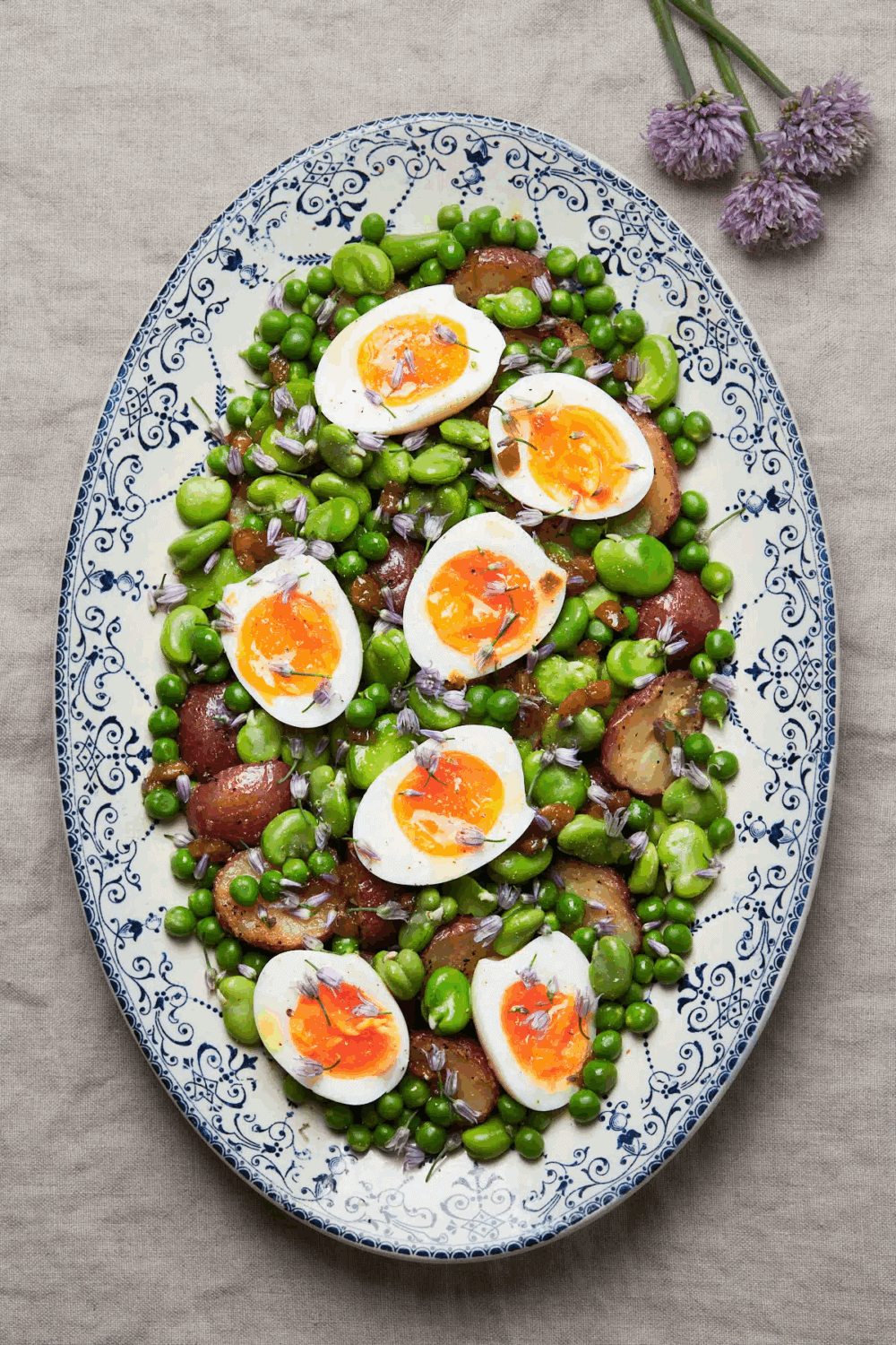 Spring potato salad with fava beans peas and olives
