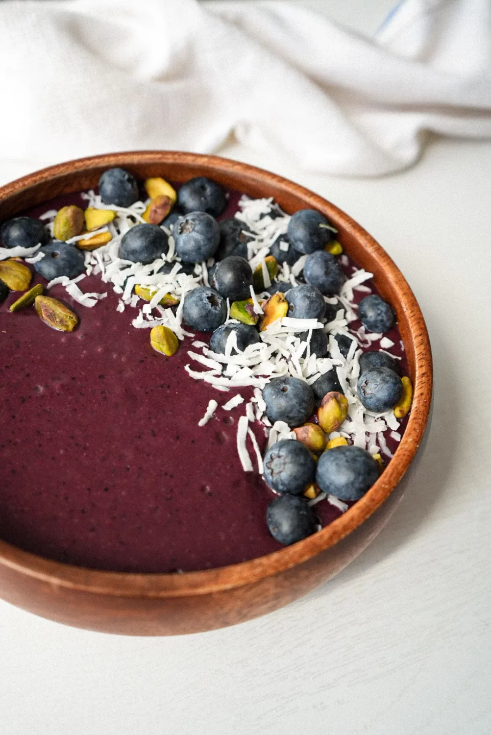 acai smoothie bowl with blueberries and pistachios