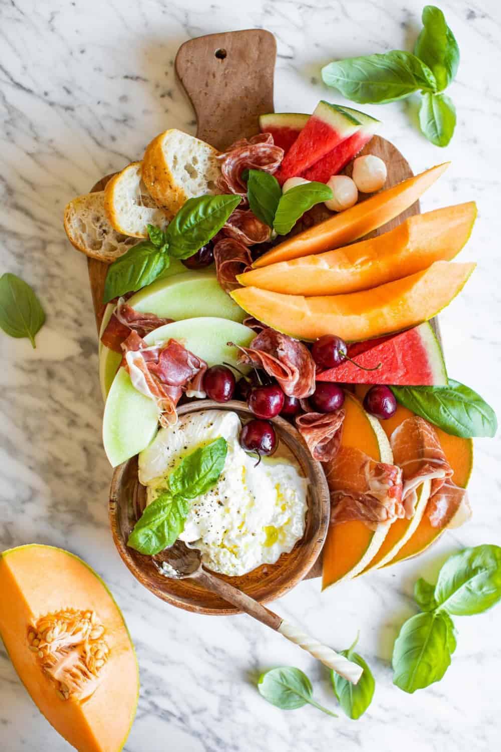 melon board with fresh mozzarella and basil 