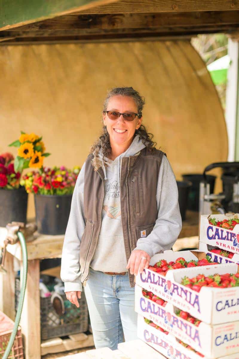 woman standing in farm stand at Halcyon Farms