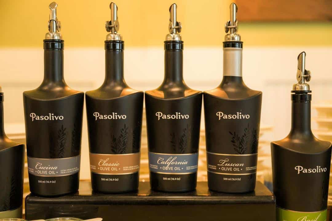 Pasolivo uses black painted bottles to protect the olive oils from damage