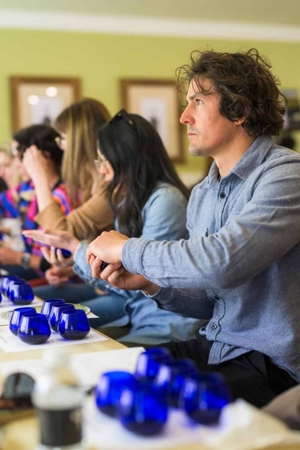 people enjoying an olive oil tasting at Pasolivo