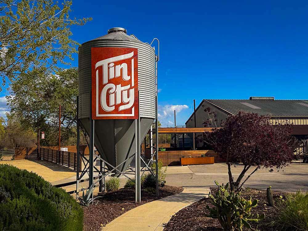 Tin City signage on a grain silo.